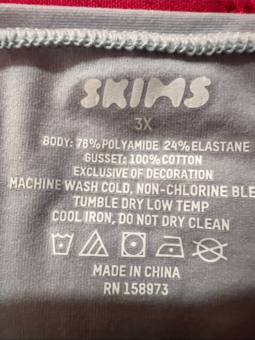 SKIMS Seamless Bikini Briefs in Light Blue and Tan - Picture 6 of 6